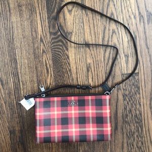 Red plaid and Black Coach purse